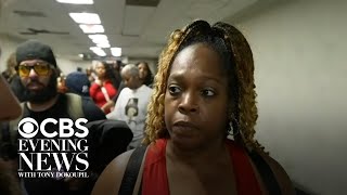 Worried travelers arrive extra early to wait in huge security lines