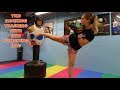 Taekwondo  boxing training with bob punching bag