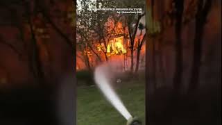 Firefighter camera captures effort to stop flames