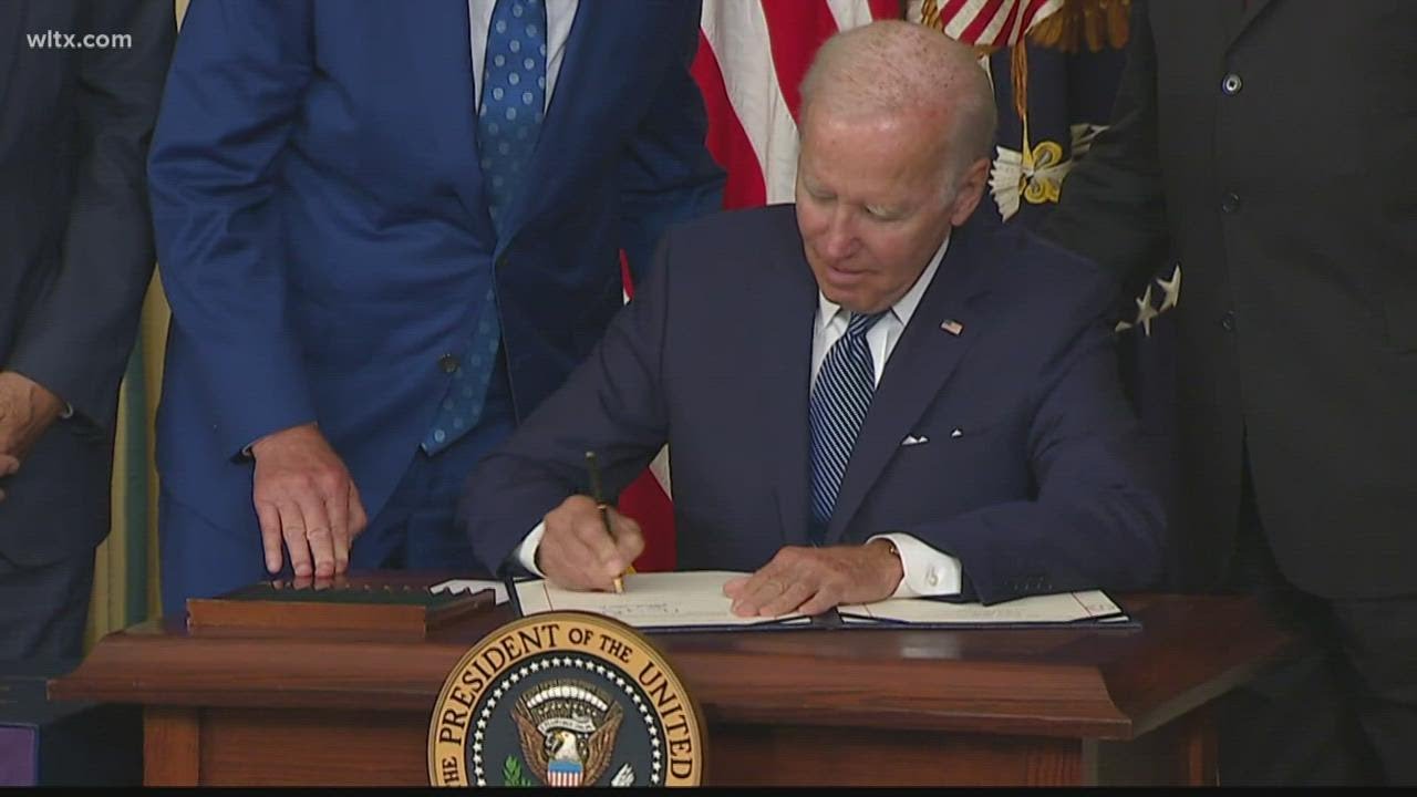 Biden signs Inflation Reduction Act into law - YouTube