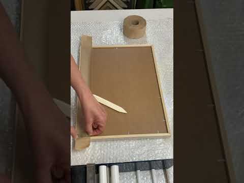 Taping up the Back of a Picture Frame 