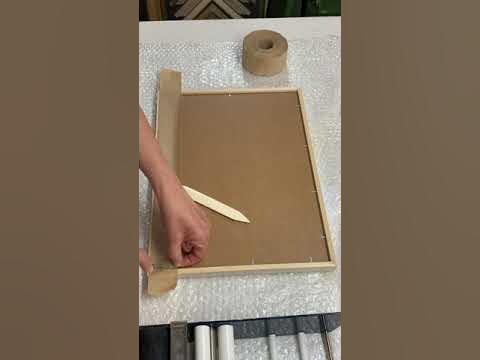 Taping up the Back of a Picture Frame 