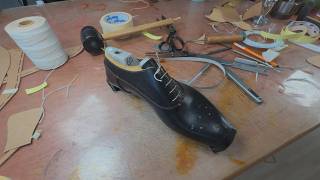 Behind: Making a new pair of Oxford shoes — Test upper lasting process.