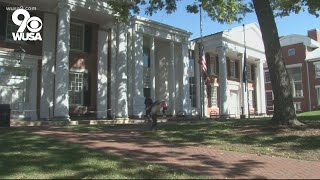 Judge declines to make decision on charges against woman testifying against alleged abuser