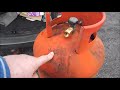 Refilling a LPG/Butane bottle at a Petrol Station LPG gas Pump Safely