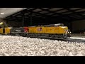 Union Pacific #2535 Es44ac Hauling  freight cars with Southern Pacific #192 Ac4400cw Ho scale 