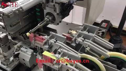 Transformer winding and bushing synchronous assembly machine