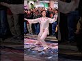 Beautiful girl performs taichi chuan in the street