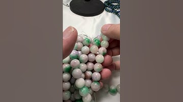 Jade, dyed, Cool green/white/lavender colors. 12mm 8" strand