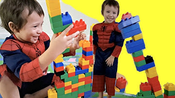 Toddlers Playing With Building Blocks Toys - Spider-Kids Build Tall Castles with Mega Bloks