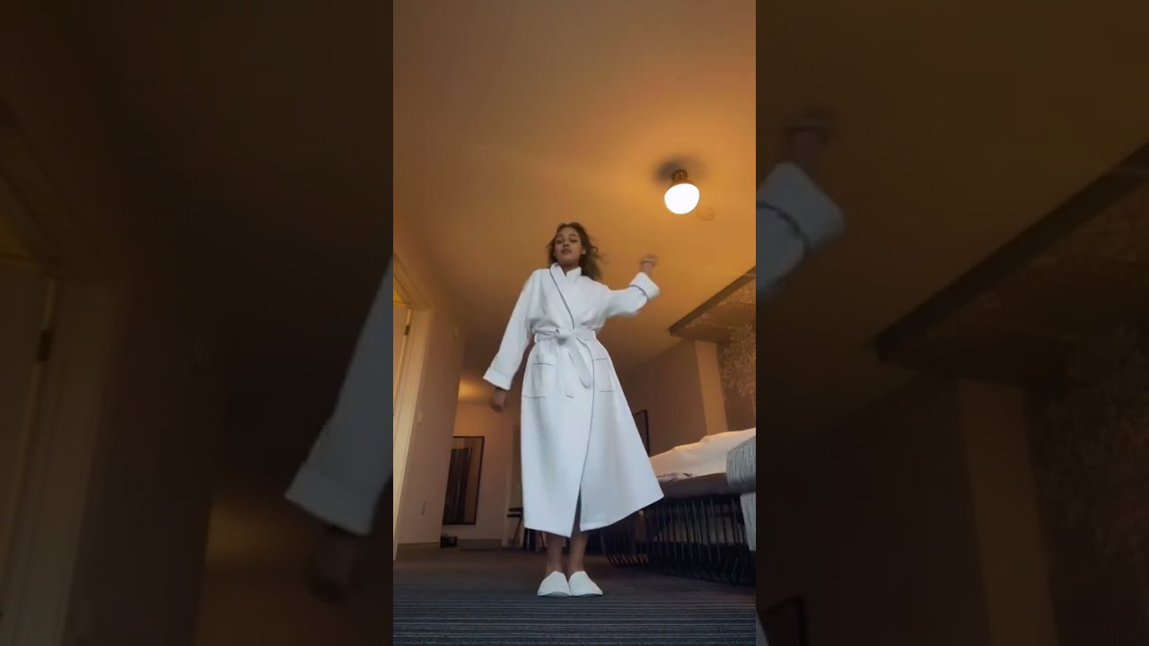 Woman Grooving in a Hotel Robe