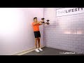 DUMBBELL WALL SUPPORTED FRONT RAISES