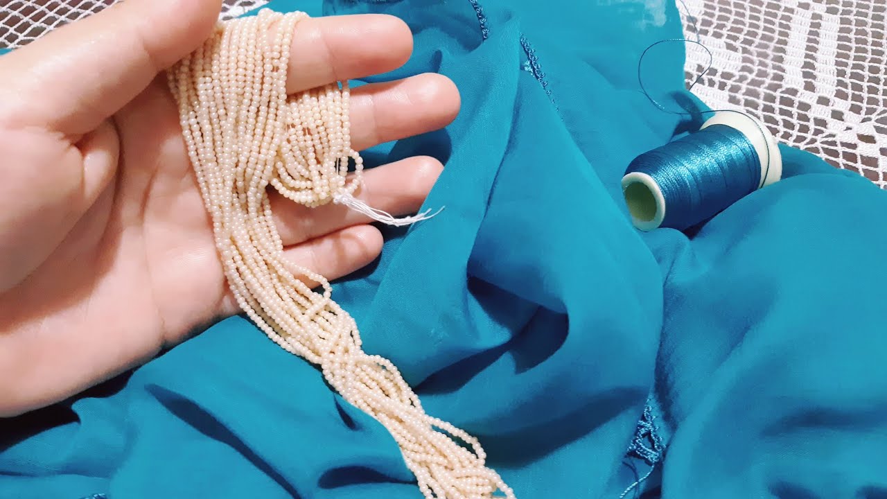 1611 - Şıkır şıkır kum boncuklu tığ oyası modeli