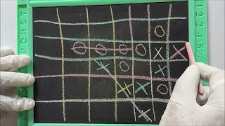 Simple  game of XO or Tic Tac Toe on a slate black board using a chalk pencil screenshot 5