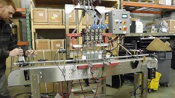 Apex Filling Systems - 4 Head Economy Pressure Gravity Filler