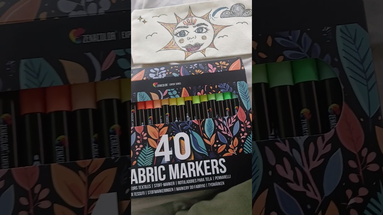 first time using fabric markers - drawing on canvas zipper pouch.  