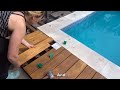 Wooden terrace around the swimming pool