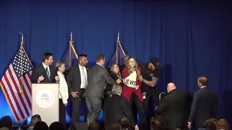 MOMENT: Two women rush stage during DeSantis speech in New Hampshire