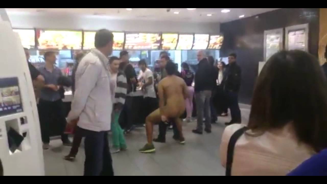 Naked Dude is running through McDonalds