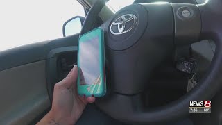 Group pushing to ban holding a phone while driving