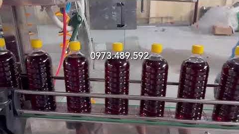 Máy chiết rót và đóng nắp chai nước mắm tự động
