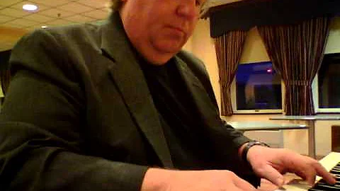 Norman Shaw on the  Baldwin acoustic piano.
