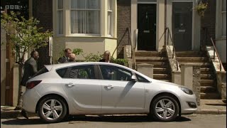 Eastenders the police arrives with max at his house as they are looking for evidence scene