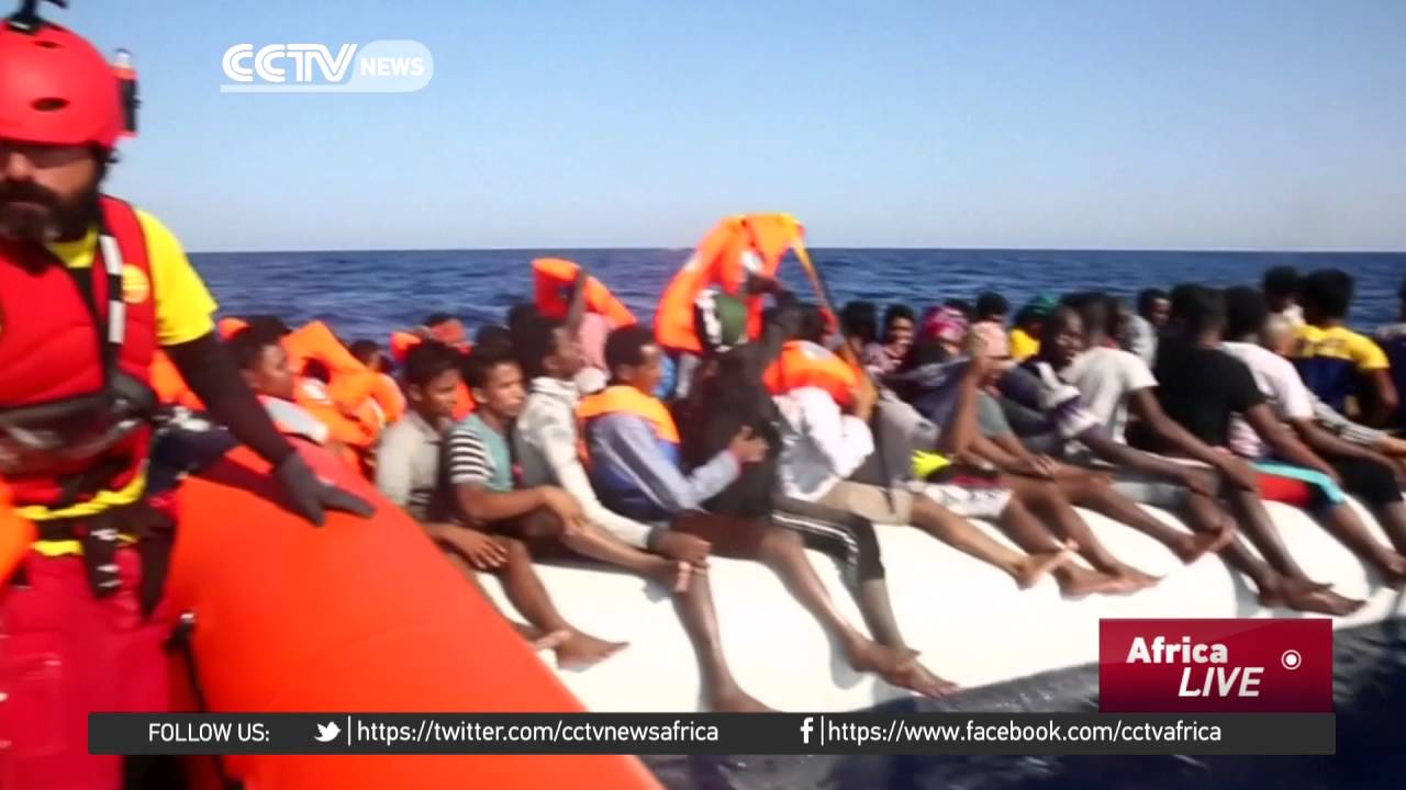 Volunteer group rescues hundreds of migrants off Libya coast - YouTube