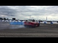 Jaguar F-type drifting at Silverstone Classic