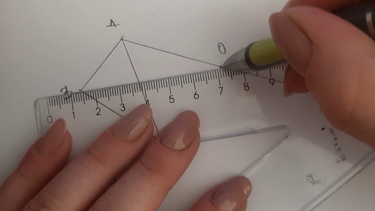 Centralna simetrija- preslikavanje trougla
