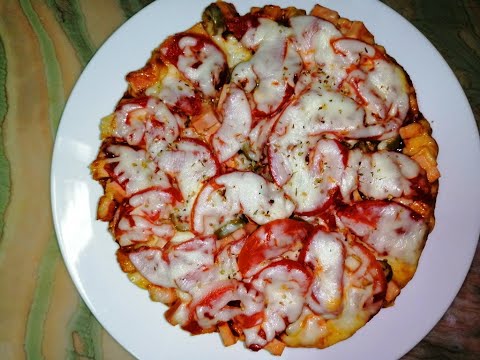 Video: How To Cook Pizza In A Multicooker?