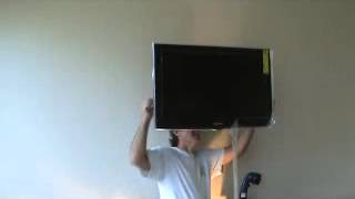QualGear Heavy-Duty Tilting TV Wall Mount for Most 37″-70″ Flat Panel and Curved TVs, Black Installing a wall mount TV...Part 8
