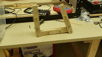 USM ACM-IEEE 2020 SoutheastCon Auto-opening mechanism for button pusher preliminary testing