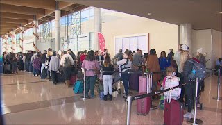 Southwest Airlines customers stuck at airports after hundreds of cancellations