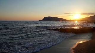 meditation music video | view of sunset | beautiful sunset over sea with sunbeam through clouds.