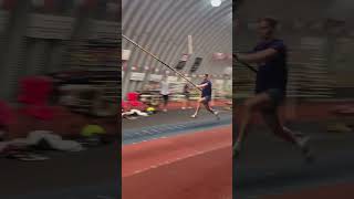 Boy snaps stick attempting to go over bar (Pole Vaulting)