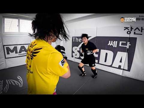 Japanese prodigy Erika spars with a Korean female champion-level fighter