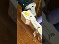 carving patterns on a cylindrical piece of wood using a power tool to make a beautiful texture