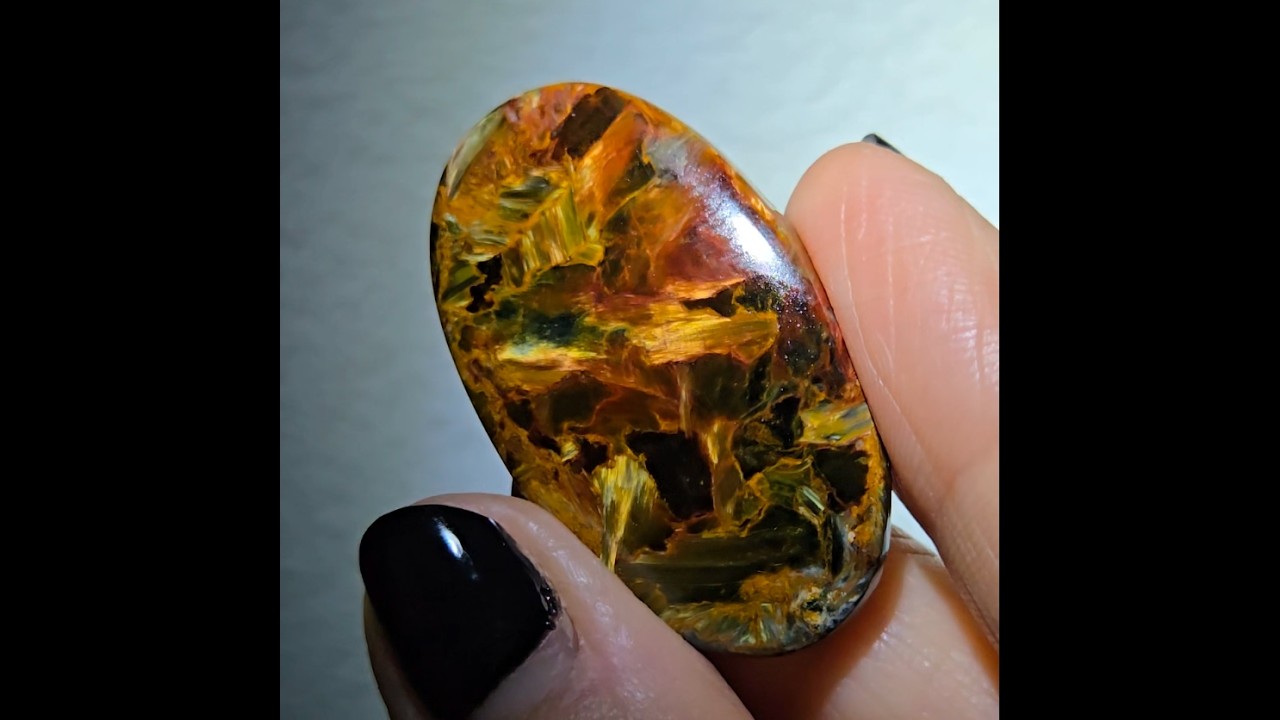 Red, blue and gold pietersite cabochon from Namibia - PT8