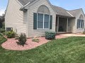 From Mulch to Stone - A No Maintenance Flower Bed Solution