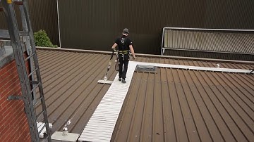 A Rooftop Safe Transfer using Horizontal Latchways device