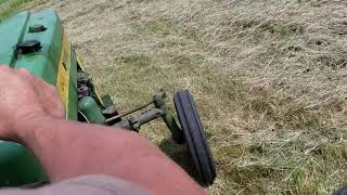 Raking hay on john deere 320