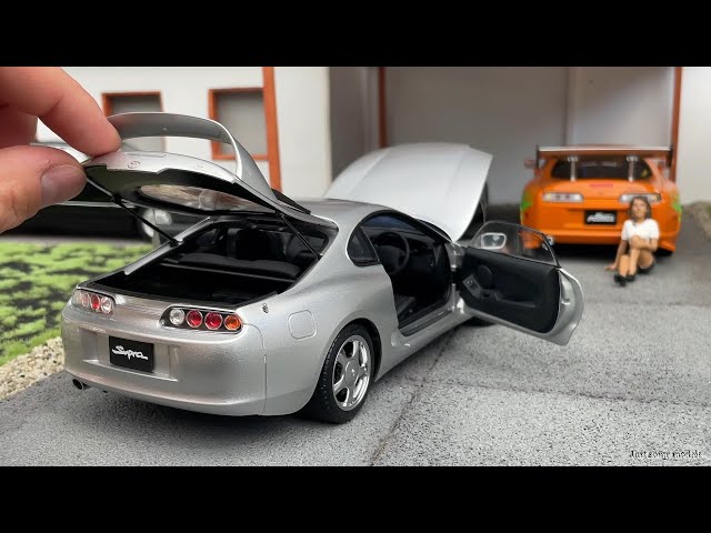 1:18 Toyota Supra (A80) with car lift, silver - LCD-Models