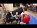 A Quadriplegic Man Learning How To Get Down From Wheelchair And Then To Get Up.