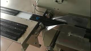 Drawer rail packing machine