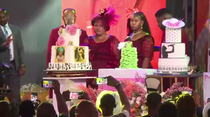 Officiating the cutting of the 50th birthday cake for Chioma Jesus by Pastor (Dr.) Ifeoma Eze