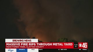 Crews battling massive fire at metal yard in Clayton County