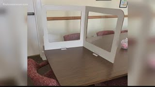 Local doctors say plastic partitions on students' desks won't stop COVID-19 spread