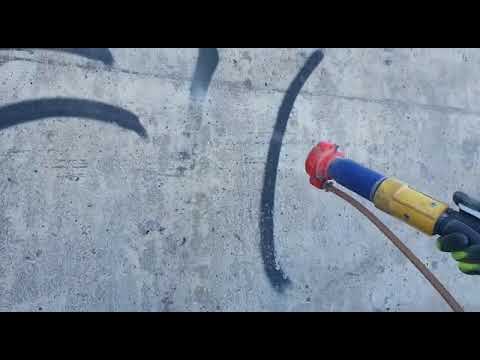 Graffitin poisto soodapuhalluksella betonipinnalta / Remiko Oy