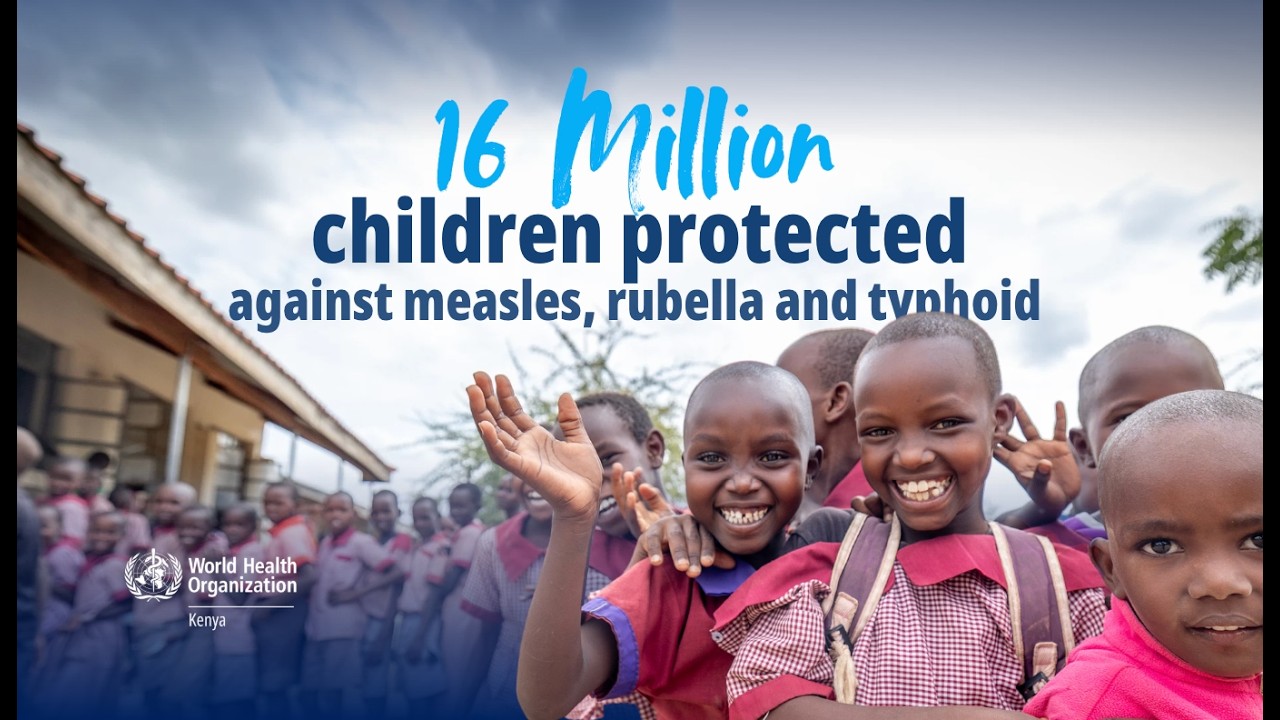 Schoolchildren waving, from the measles and rubella vaccination campaign